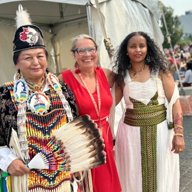 Stephanie Yuill, centre, with Canada Day performers. Dieselle Ford/Cabin Radio