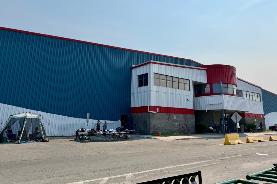 A donated clothing area outside the multiplex in Yellowknife on July 2, 2026. Eshana Gohil/Cabin Radio