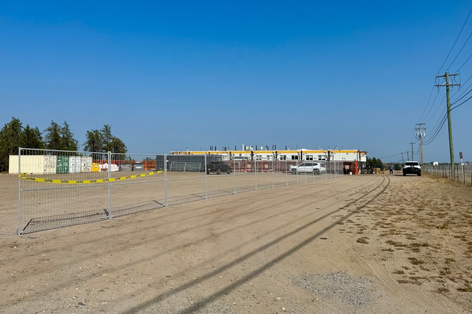 The transitional housing facility, with a barrier up for festival weekend, on July 15, 2026. Eshana Gohil/Cabin Radio