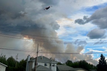An air tanker over Fort Simpson on July 4, 2026. Photo: Mike Canney