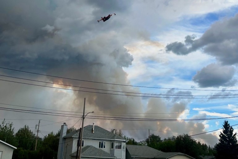 An air tanker over Fort Simpson on July 4, 2026. Photo: Mike Canney