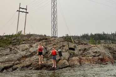 Ignat Tarskii and Nick Girvan were among Yellowknifers who rapidly responded to a brush fire on July 1, 2026. Photo submitted by Scott Robertson