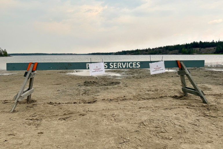 Barriers were placed between the water and the beach at Fred Henne Territorial Park. Ollie Williams/Cabin Radio