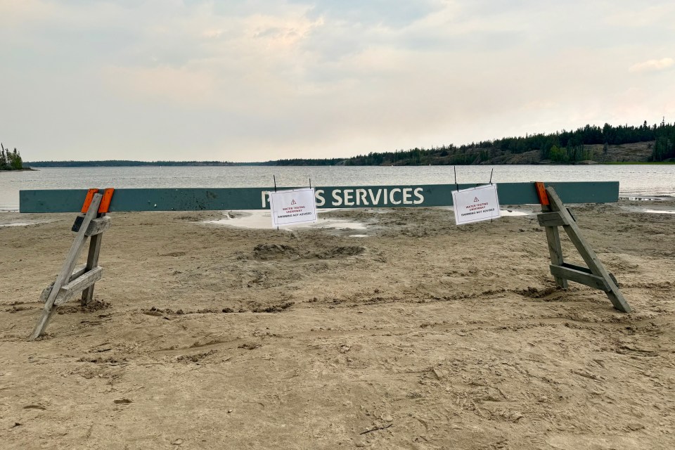 Barriers were placed between the water and the beach at Fred Henne Territorial Park. Ollie Williams/Cabin Radio