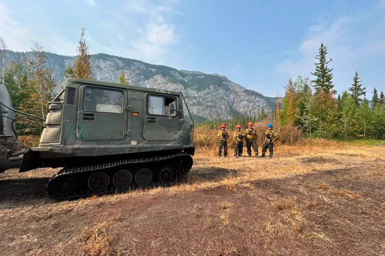 Heavy equipment being used to fight the wildfire north of Wrigley. Photo: NWT Fire