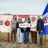 Dignitaries at a housing announcement in Yellowknife on July 27, 2026. Aastha Sethi/Cabin Radio