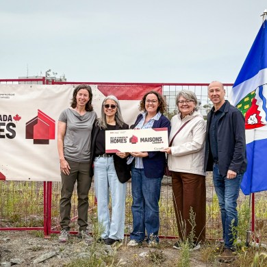 Dignitaries at a housing announcement in Yellowknife on July 27, 2026. Aastha Sethi/Cabin Radio