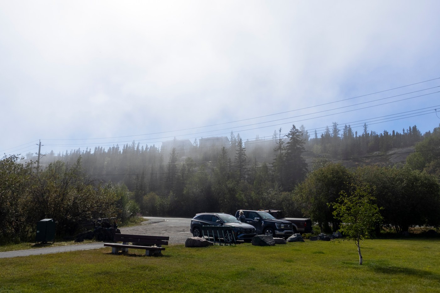 Fog rolls into Yellowknife on the afternoon of July 28, 2026. The conditions were enough to briefly fox the city's fire hall, which spent 10 minutes pursuing a fire before concluding fog was the issue. Ollie Williams/Cabin Radio