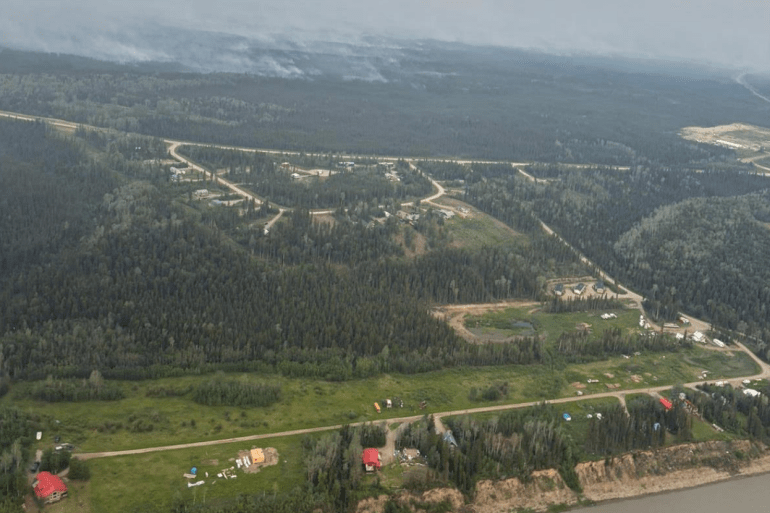 Fire FS016 near Fort Simpson's Wildrose subdivision on the morning of July 1, 2026. Photo: NWT Fire