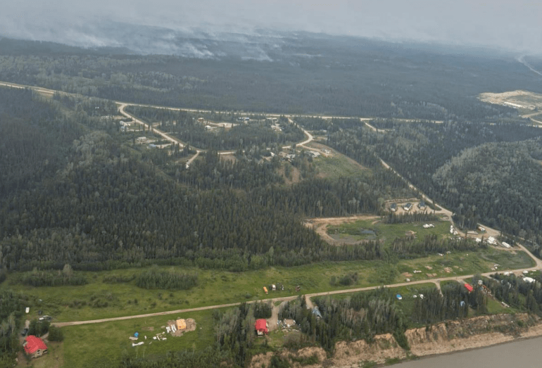 Fire FS016 near Fort Simpson's Wildrose subdivision on the morning of July 1, 2026. Photo: NWT Fire