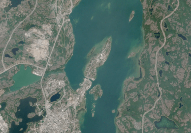 The Ndılǫ peninsula, centre, above the city of Yellowknife, is seen in a Sentinel-2 satellite image from June 30, 2026.