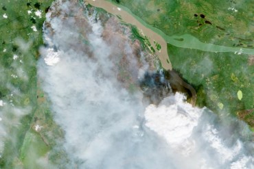 Fire FS016 and Fort Simpson are seen in a Sentinel-2 satellite image on July 4, 2026.
