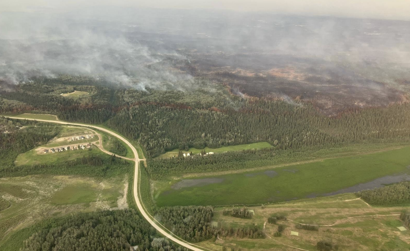 Fort Simpson fire: Crews report progress in more helpful conditions