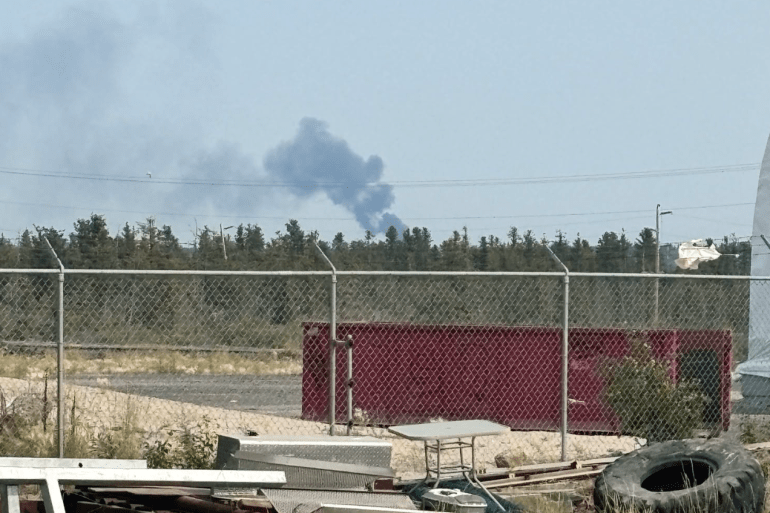 An NWT Fire image of smoke from a wildfire reported to be near Aurora Village on July 18, 2026.
