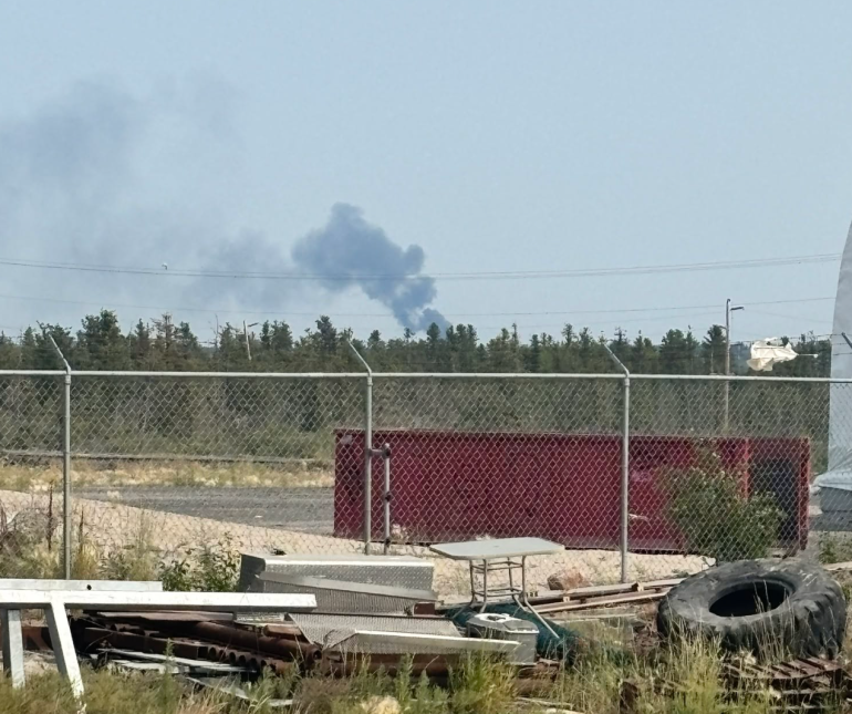 An NWT Fire image of smoke from a wildfire reported to be near Aurora Village on July 18, 2026.