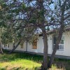 Boarded windows at Yellowknife's Mary Murphy seniors' home in July 2026. Photo: Alice Twa/Cabin Radio