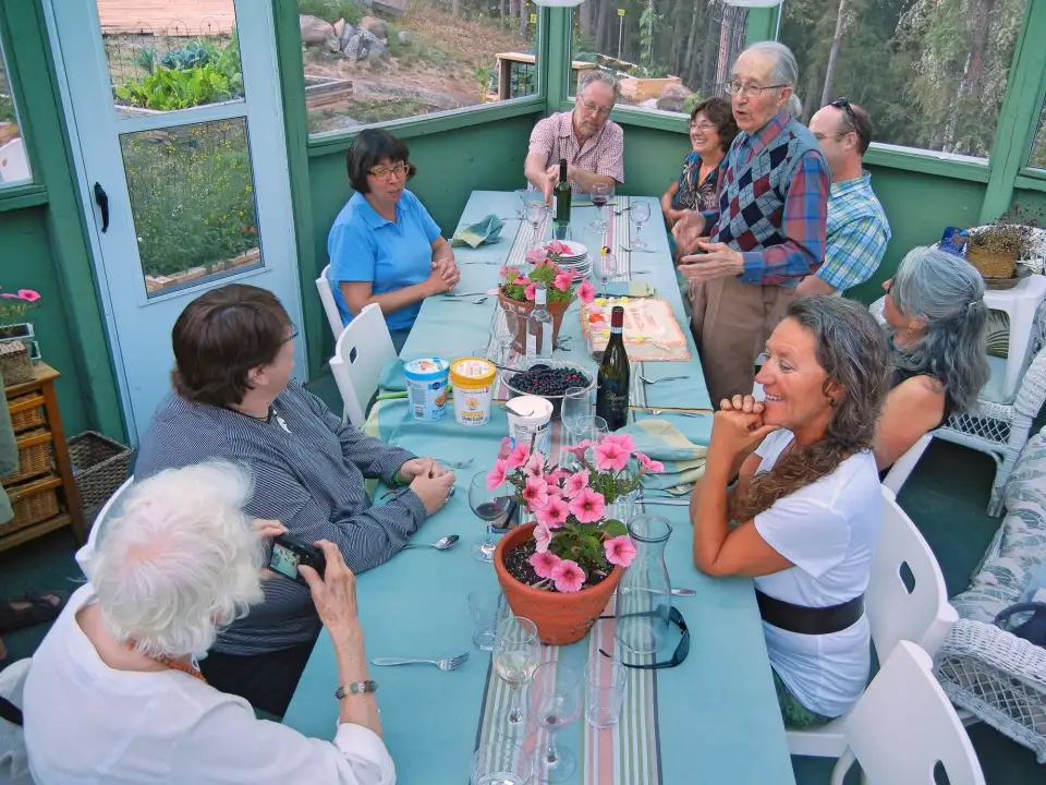 Suzette Montreuil, top left in blue, at a birthday party held for Rene Fumoleau. Photo: Submitted