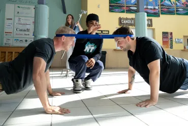 Roughly 270 education workers attended a series of key cultural experience workshops, including northern games like the head pull, for YK1's Indigenous Languages Education Professional Development Day on August 25, 2026. Natasha Bulowski/Cabin Radio