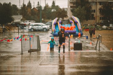 Escaping the rain after soccer. Photo: Vincent Ret
