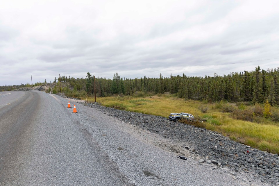 A truck is pictured in scrubland off the side of the Ingraham Trail just outside Yellowknife on August 24, 2026. Ollie Williams/Cabin Radio