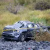 A truck is pictured in scrubland off the side of the Ingraham Trail just outside Yellowknife on August 24, 2026. Ollie Williams/Cabin Radio