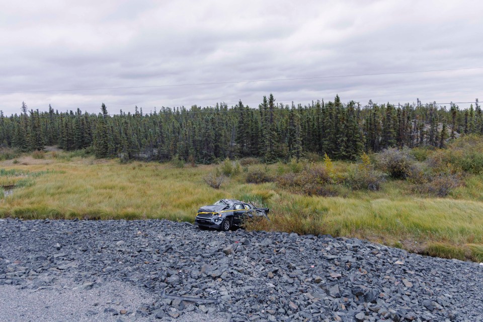 A truck is pictured in scrubland off the side of the Ingraham Trail just outside Yellowknife on August 24, 2026. Ollie Williams/Cabin Radio