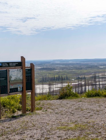 A sign overlooking the salt plains in Wood Buffalo National Park. Ollie Williams/Cabin Radio
