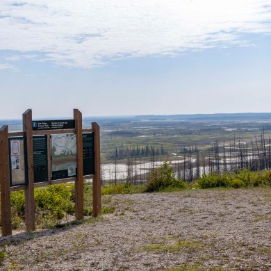 A sign overlooking the salt plains in Wood Buffalo National Park. Ollie Williams/Cabin Radio
