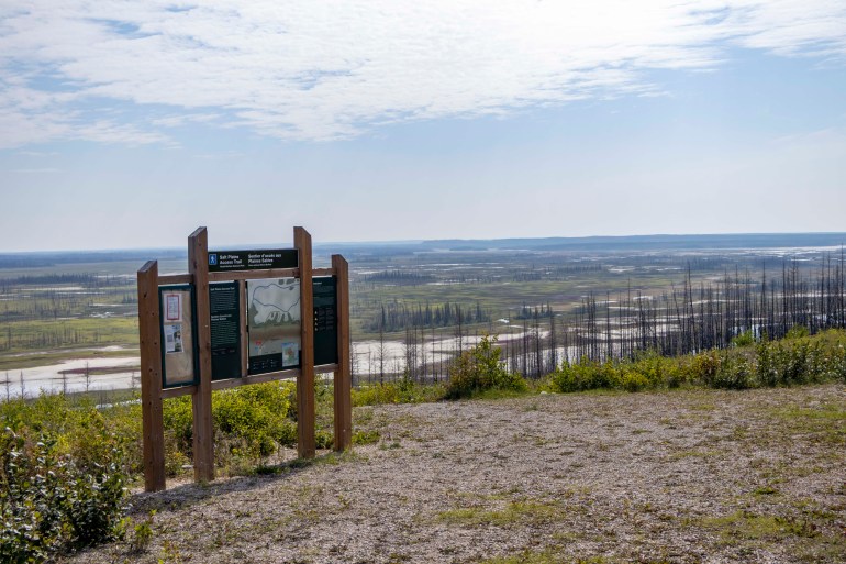 A sign overlooking the salt plains in Wood Buffalo National Park. Ollie Williams/Cabin Radio