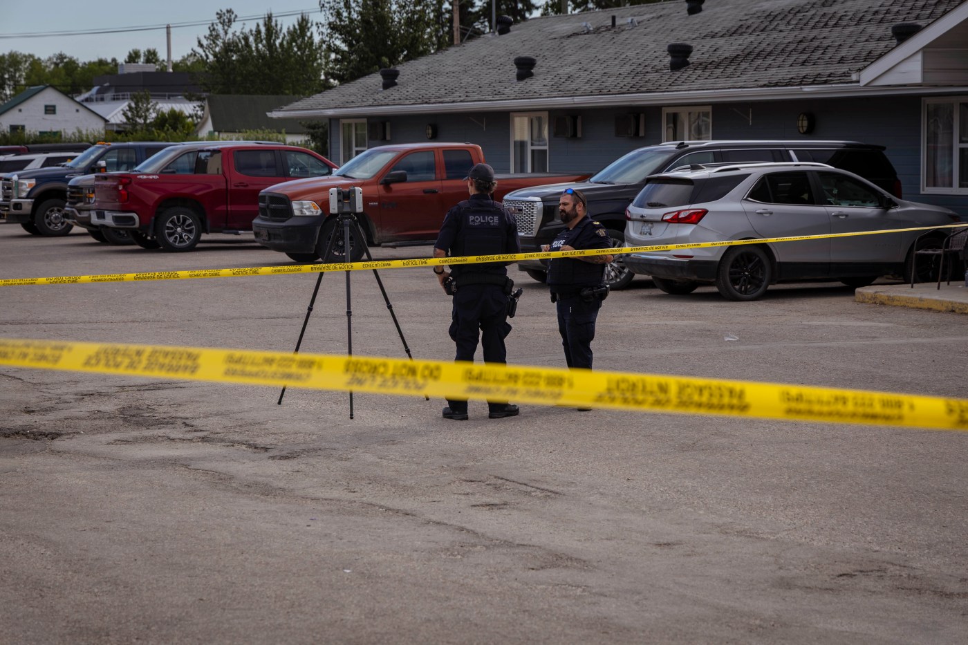 Police officers at the scene of Saturday's shooting outside the Dirty O'Fergie's bar. Ollie Williams/Cabin Radio