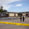 The scene of a shooting in Fort Smith is demarcated by caution tape on August 22, 2026. Ollie Williams/Cabin Radio