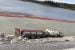 Dump truck working on Ingraham Trail removed from Pontoon Lake