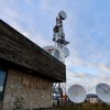 Telecoms infrastructure outside the Northwestel building in Norman Wells. Emily Blake/Cabin Radio